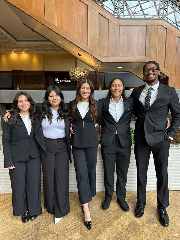 Five Skyline Marketing Agency team members in business attire